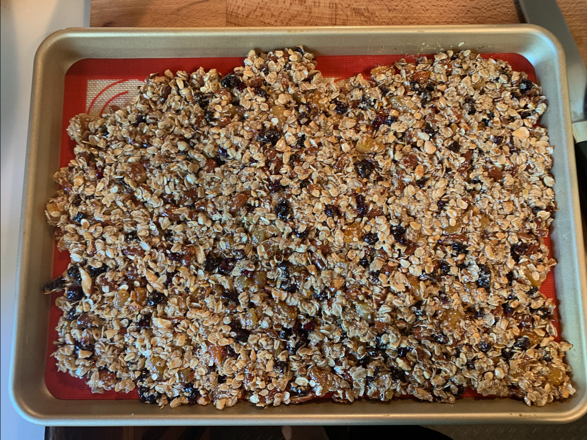 Granola spread out on pan